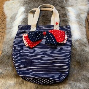 CHARLOTTE RUSSE CANVAS PURSE with a bow